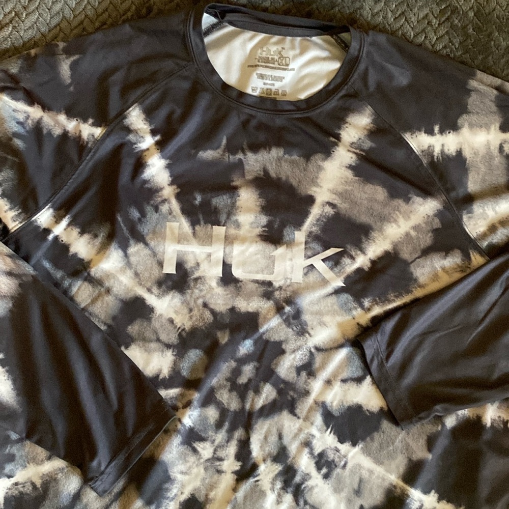 Long sleeve HUK workout shirt good for jogging working out and it keeps you cool